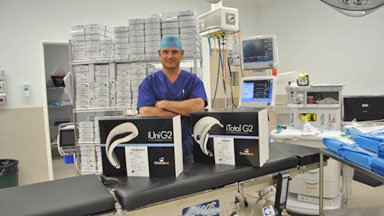 CUSTOMISED KNEE REPLACEMENT: Dr Nick Hartnell with the custom knee replacements before the surgery. Photo: Madeline Crittenden.